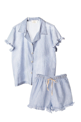 Blue and white striped pajama set on a white background